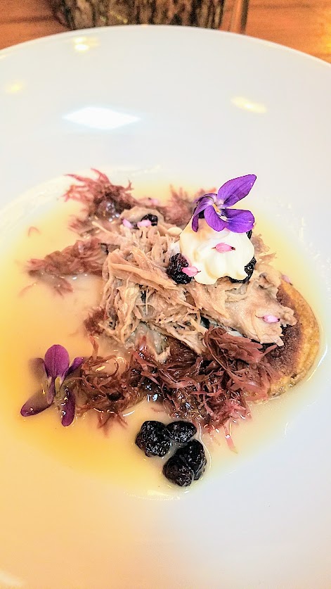 Fimbul Icelandic Dinner Spring 2018, Hay-smoked duck, Skyr, preserved huckleberries in whey, a broth of dulse and whey, rye dumpling. Inspired by how the North Arctic area early culture ate sea birds