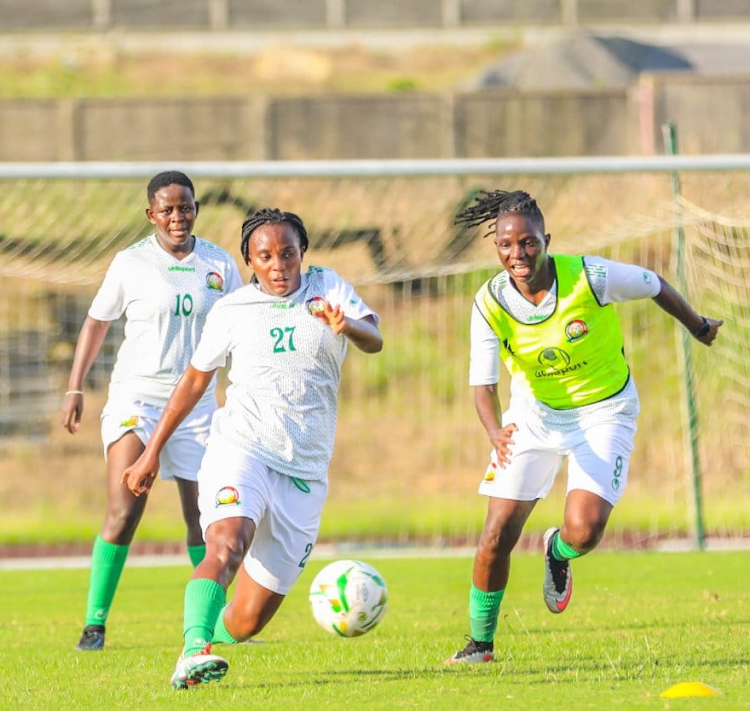 Harambee Stars' Elizabeth Wambui (27) battles for the ball with Valerie Nekesa during a training sessions