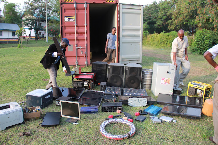 Detectives are near the stolen items at Homa Bay police station on Augsut 17,2022