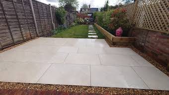 Garden patio with sleepers and stepping stones album cover