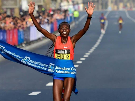 Ruth Chepngetich crosses the finish line to win the Dubai Marathon on Friday, January 25, 2019. /COURTESY