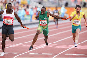 Akani Simbine of South Africa anchors his team home in the mens 4x100m relay final during the athletics on day 10 of the Gold Coast 2018 Commonwealth Games at the Carrara Stadium on April 14, 2018 in Gold Coast, Australia. 