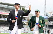 England captain Ben Stokes tosses the coin alongside SA counterpart Dean Elgar on day one of the first Test at Lord's Cricket Ground  in London on August 17 2022.