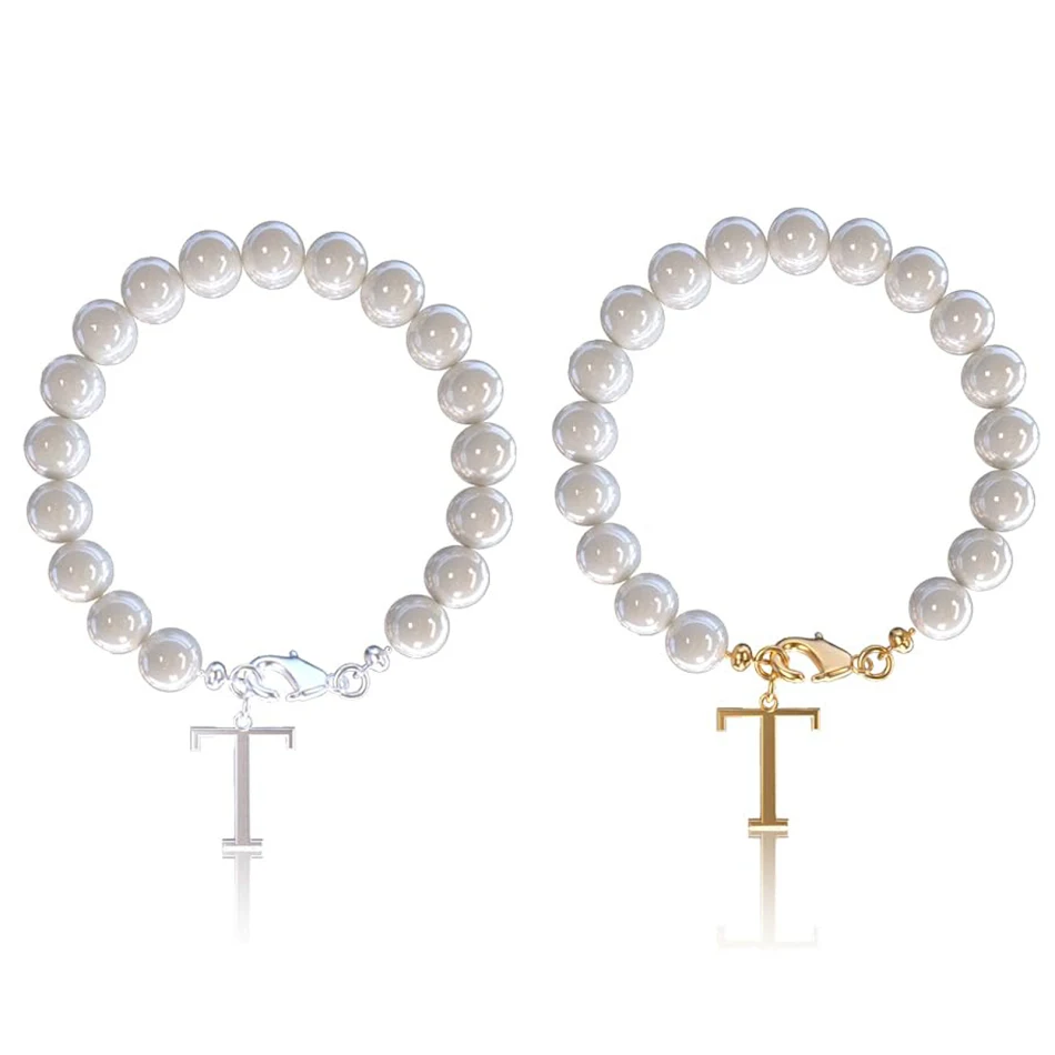 Pulseira de letras Conjunto de aço inoxidável Cordão de pérolas Crie seu estilo único com esta pulseira elegante. Presente perfeito e personalizado para qualquer ocasião.