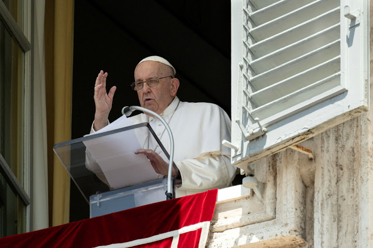 Pope Francis leads the Angelus prayer from his window, at the Vatican, July 9, 2023.