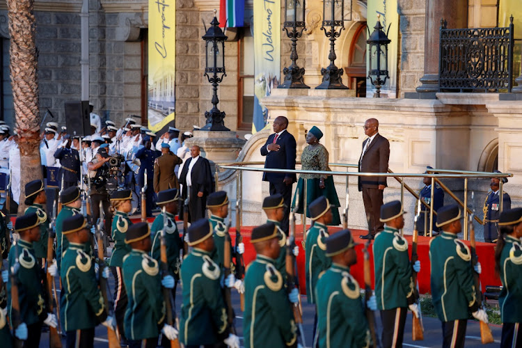 President Cyril Ramaphosa gestures while standing next to speaker of the National Assembly Nosiviwe Mapisa-Nqakula ahead of the Sona at the Cape Town City Hall on February 8 2024.