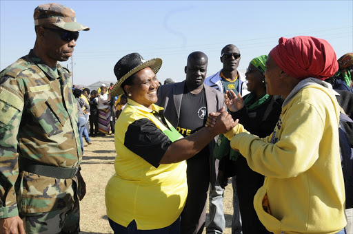 July 13, 2016. CAMPAIGNING: Thoko Didiza talking to residents of Lotus Gardens, near Atteridgeville, Pretoria Pic: Peter Mogaki. © Sowetan.