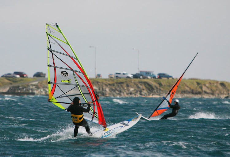 British Columbia is known for water sports of all types, such as sailboarding (or windsurfing) near Dallas Road Beach in Victoria. 