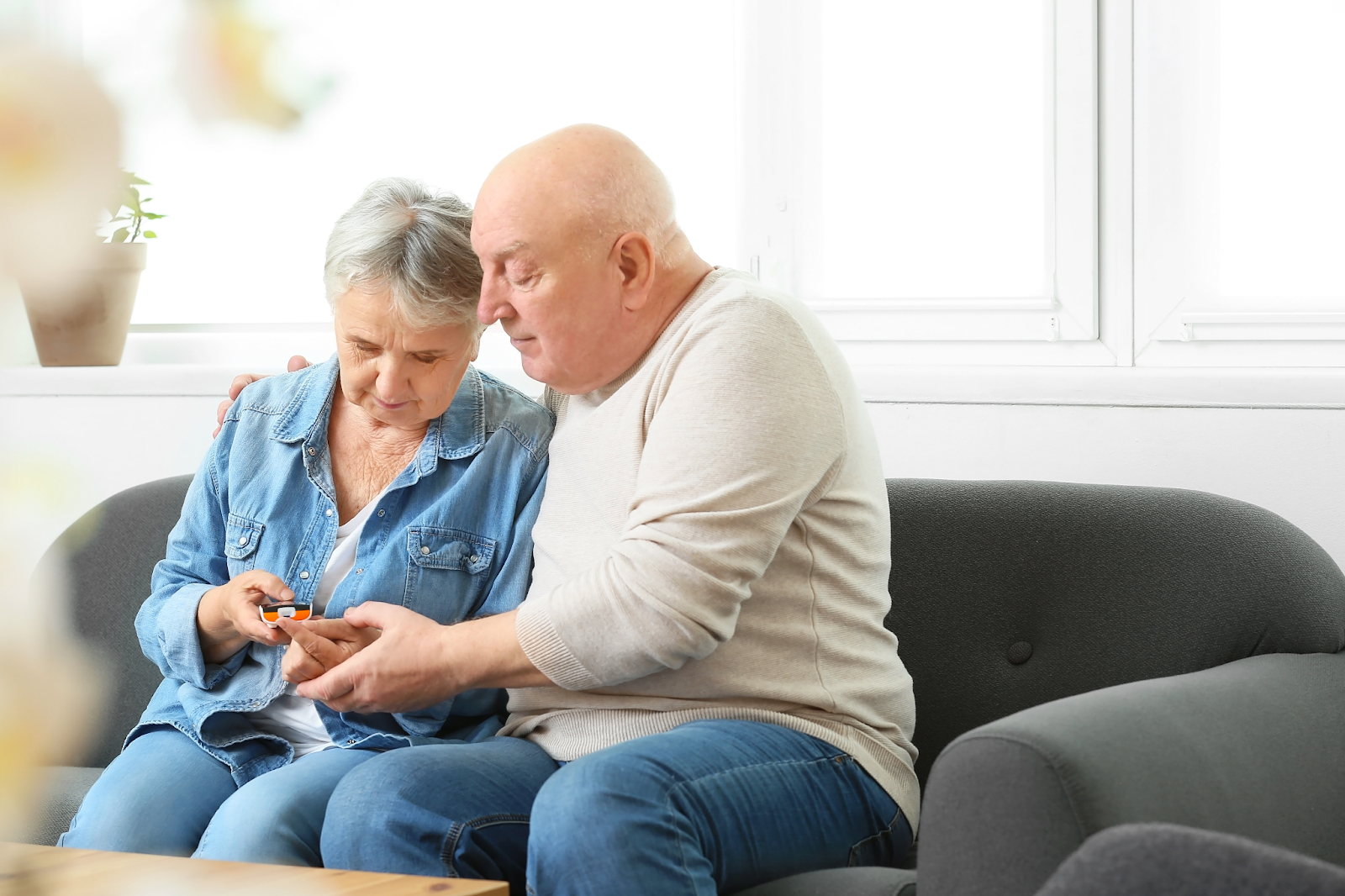 man and woman checking for diabetes in seniors