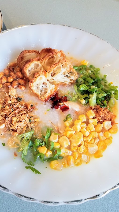 Bubur Ayam, a Chinese Indonesian take on congee, with shredded chicken, Chinese celery, Chinese doughnut, crispy fried soybeans, freeze dried corn, sweet soy, shallot, chili crisp. This was also available vegetarian with pickled and roasted mushroom instead of shredded chicken. at Gado Gado Portland Breakfast pop up at Guilder during MLK weekend 2019