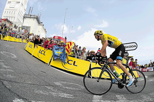 TOUGHEST CLIMB: Current race leader and wearer of the Maillot Jaune, Chris Froome of Great Britain and Sky Procycling attacks to win stage 15 of the Tour de France, a 242.5km road stage from Givors to Mont Ventoux.