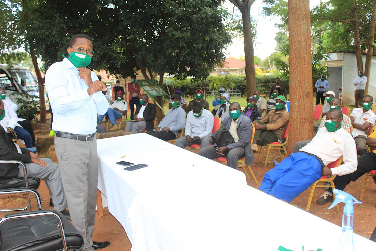 Governor Mwangi wa Iria addressing boda boda saccos' chairmen outside his office in Murang'a town.