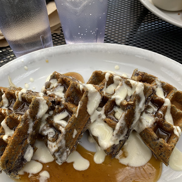Blue Corn Waffle with a goat cheese sauce and a Bourbon syrup