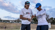 Trainer Brendan McBirnie with Bonani Zuke ahead of the Sanlam Cape Town marathon on September 15.