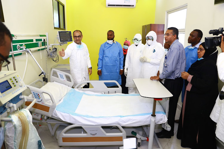 Governor Joho, flanked by senior county and national government officials, at an isolation ward at Coast General Hospital.