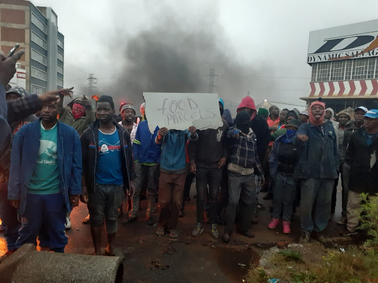 Disgruntled community members from Booysens squatter camp have blocked Eloff Street.