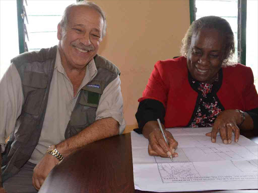 Former Taveta MP Basil Criticos with Taita Taveta deputy governor Mary Ndigha at Taveta on Thursday. /RAPHAEL MWADIME