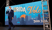 Democratic US presidential nominee and former Vice President Joe Biden walks on stage at a drive-in, Get Out the Vote campaign stop in Tampa, Florida, US, October 29, 2020. 