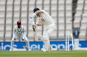 Joe Denly is clean bowled by West Indies' Shannon Gabriel.