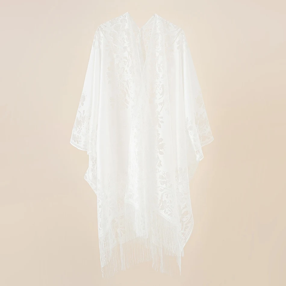 Blusa de renda para férias na praia e capa de proteção solar