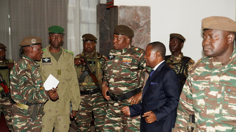 Gen Abdourahmane Tiani, who was declared head of state of Niger by leaders of a coup, arrives to meet ministers in Niamey, Niger, on July 28.