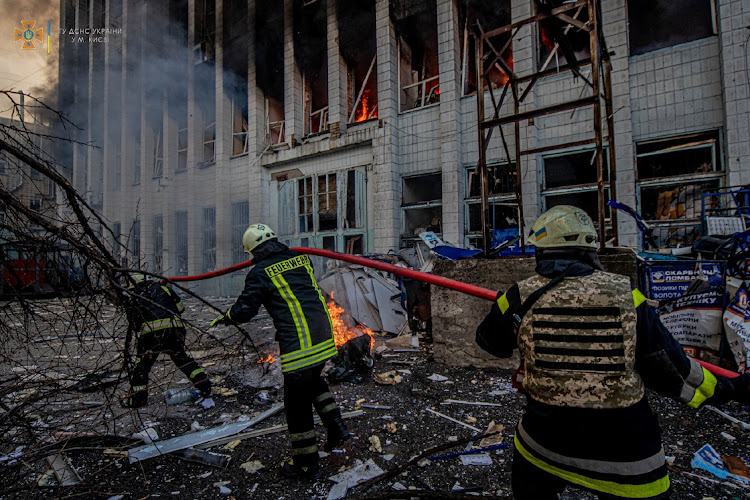 Rescuers work at a site of an industrial building damaged by an airstrike, as Russia's attack on Ukraine continues, in Kyiv, Ukraine, March 22 2022. Picture: STATE EMERGENCY SERVICE/REUTERS