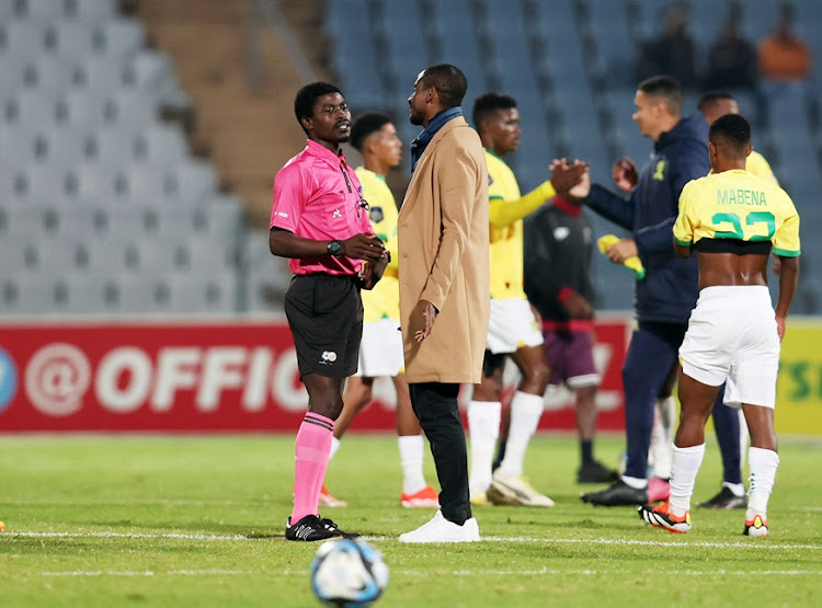 Mamelodi Sundowns coach Rulani Mokwena in discussions with referee Jelly Chavani after the DStv Premiership match against Moroka Swallows at Dobsonville Stadium on Monday night.