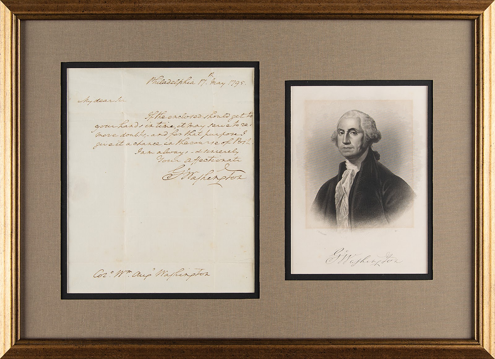 George Washington free franked letter framed alongside an engraving of the first U.S. president.