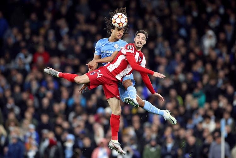 Atletico Madrid's Sime Vrsaljko in action with Manchester City's Nathan Ake