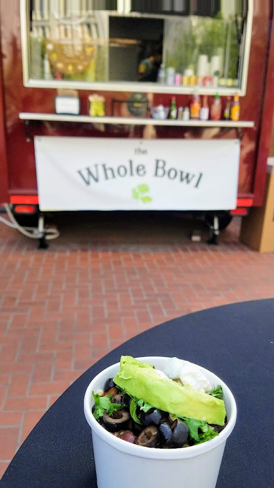 Pioneer Courthouse Square, Carts on the Square food cart pod, Whole Bowl cart. If you are looking for a healthy option especially if you are vegetarian or vegan, this is a great cart to make your go-to. It's extremely popular and successful- this downtown location is one of eight around the city. The bowl starts with a base of brown rice and black and red beans and includes toppings you can customize including salsa, avocado, sour cream, Tillamook cheddar, black olives, cilantro, and their signature Tali sauce.