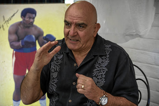 Stan Christodoulou, the legendary boxing referee and judge, at his home.