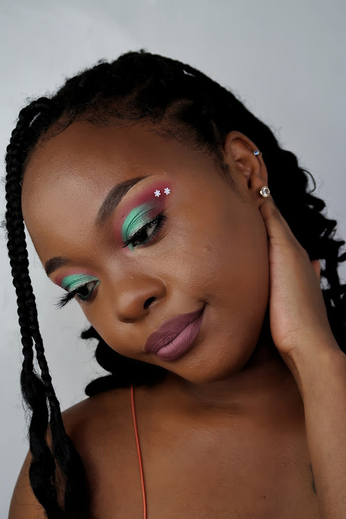 Makeup artist Wanyaga Kiki in an expressive festive look