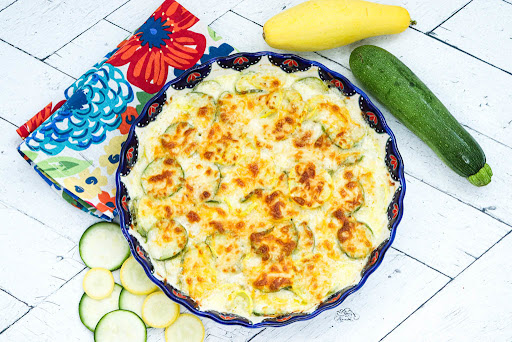 Zucchini and Squash Au Gratin baked until golden brown.