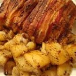 Bacon-Roasted Chicken with Potatoes was pinched from <a href="http://allrecipes.com/Recipe/Bacon-Roasted-Chicken-with-Potatoes/Detail.aspx" target="_blank">allrecipes.com.</a>