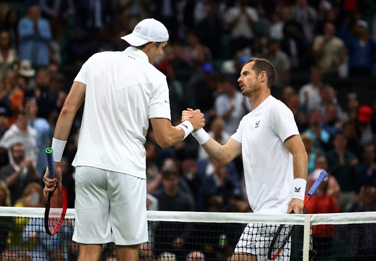 John Isner of the US after winning his second round match against Britain's Andy Murray at Wimbledon in London, on June 29, 2022