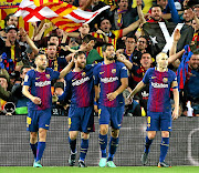 Jordi Alba, Lionel Messi, Luis Suarez, and captain Andrés Iniesta.  