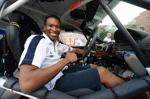 Gugu Zulu during day 1 of the 2013 Sasol Rally scrutineering in Sabie, Mpumalanga on April 18, 2013 in Mpumalanga.