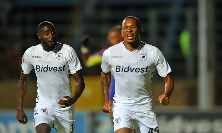 Bidvest Wits striker Lehlohonolo Majoro (R) celebrates with teammate Deon Hotto (L) after scoring the opening goal in a 2-0 Absa Premiership win over visiting Chippa United at Bidvest Stadium in Johannesburg on Friday December 21 2018.