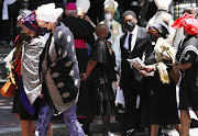 Mpho Tutu and Nontombi Naomi Tutu with family members after the service of their late father Archbishop Emeritus Desmond Tutu at an official state funeral held at the St. George's Cathedral in Cape Town. 