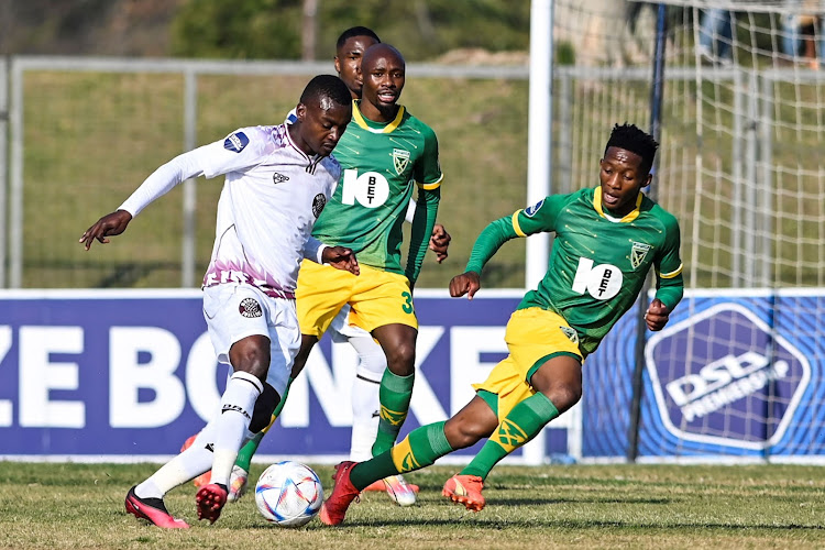 Tshediso Patjie of Swallows FC and Tebogo Motloung of Golden Arrows FC during the DStv Premiership match at Mpumalanga Stadium on August 05, 2023.