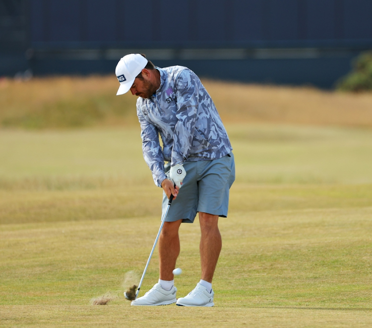 SA's Louis Oosthuizen plays an approach shot on the second hole during a practice round ahead of the 150th Open Championship at St Andrews Old Course on July 12 in St Andrews. Picture: GETTY IMAGES/ KEVIN C COX