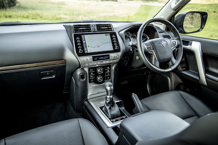 The 'Black' interior option gets matte-finish walnut wood trim.