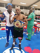 Trainer Sanele Mthalane and WBF champ Gcina Makhoba. Photo Supplied