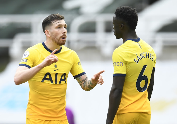 Tottenham Hotspur's Pierre-Emile Hojbjerg talks to Davinson Sanchez in their Premier League match against Newcastle United at St James' Park, Newcastle on April 4, 2021