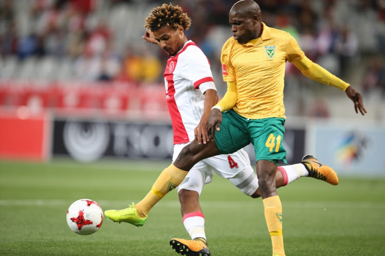 Rivaldo Coetzee and Lerato Lamola during the Absa Premiership match between Ajax Cape Town and Golden Arrows at Cape Town Stadium on August 19, 2017 in Cape Town, South Africa.