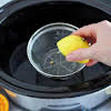 Thumbnail For Lemon And Orange Juice Added To A Crock Pot.