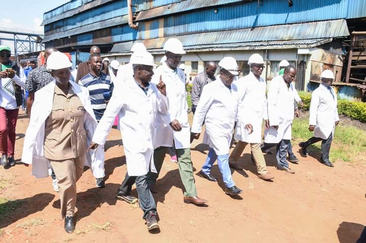 Governor Kenneth Lusaka and Kanduyi MP John Makali leads company top management to a tour of the factory before re-opening on December 9,2023.