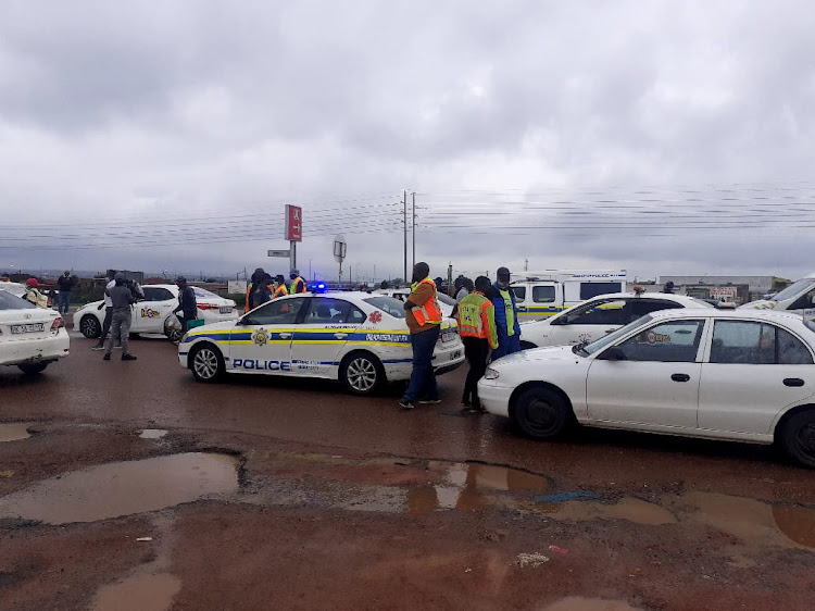 Members of the SA National Taxi Council take part in a motorcade on Monday to raise awareness over the killing of taxi drivers and commuters being robbed in the Tshwane area.