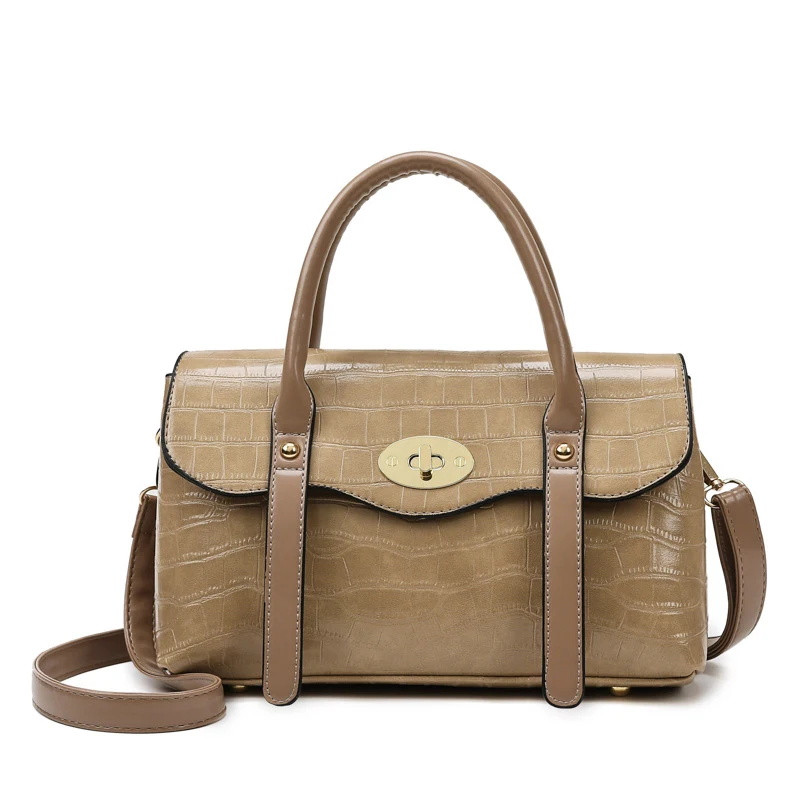 Dames modieuze grote handtas met reliëf en één schouderband. Perfect om in de hand te dragen, elegant en praktisch voor dagelijks gebruik.
