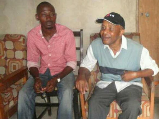 A file photo of veteran KBC radio broadcaster Eddy Fondo with relative Kelvin Safari Fondo in his Kaloleni home. /ELIAS YA